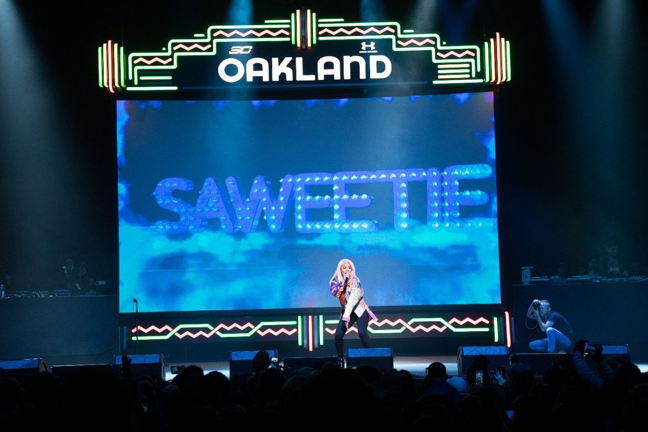 Saweetie performs on stage