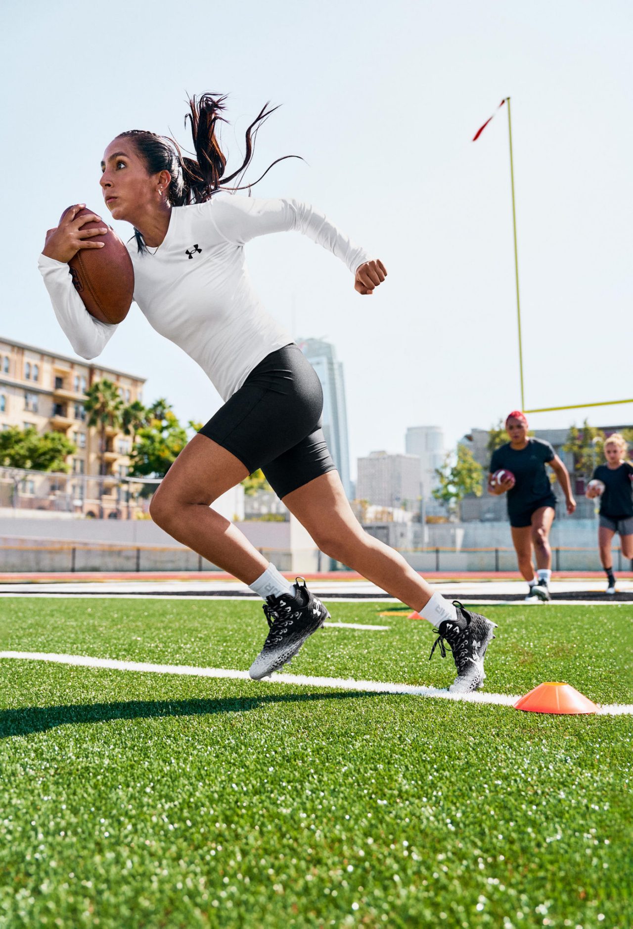 Diana Flores playing flag football