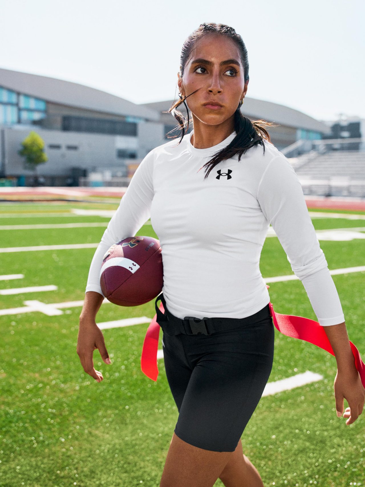 Diana Flores holding football