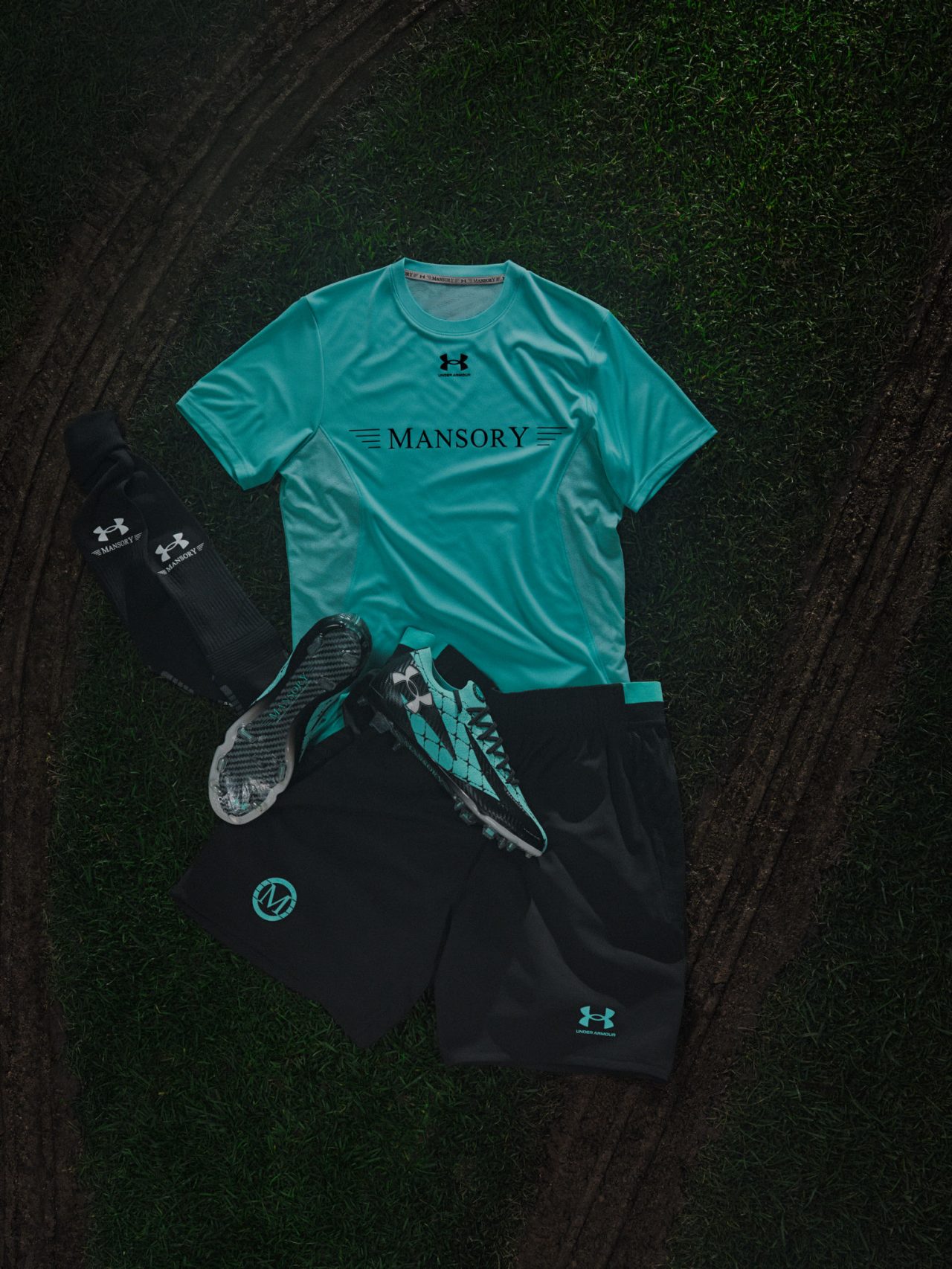 UA X Mansory Shadow Apparel Flat Lay