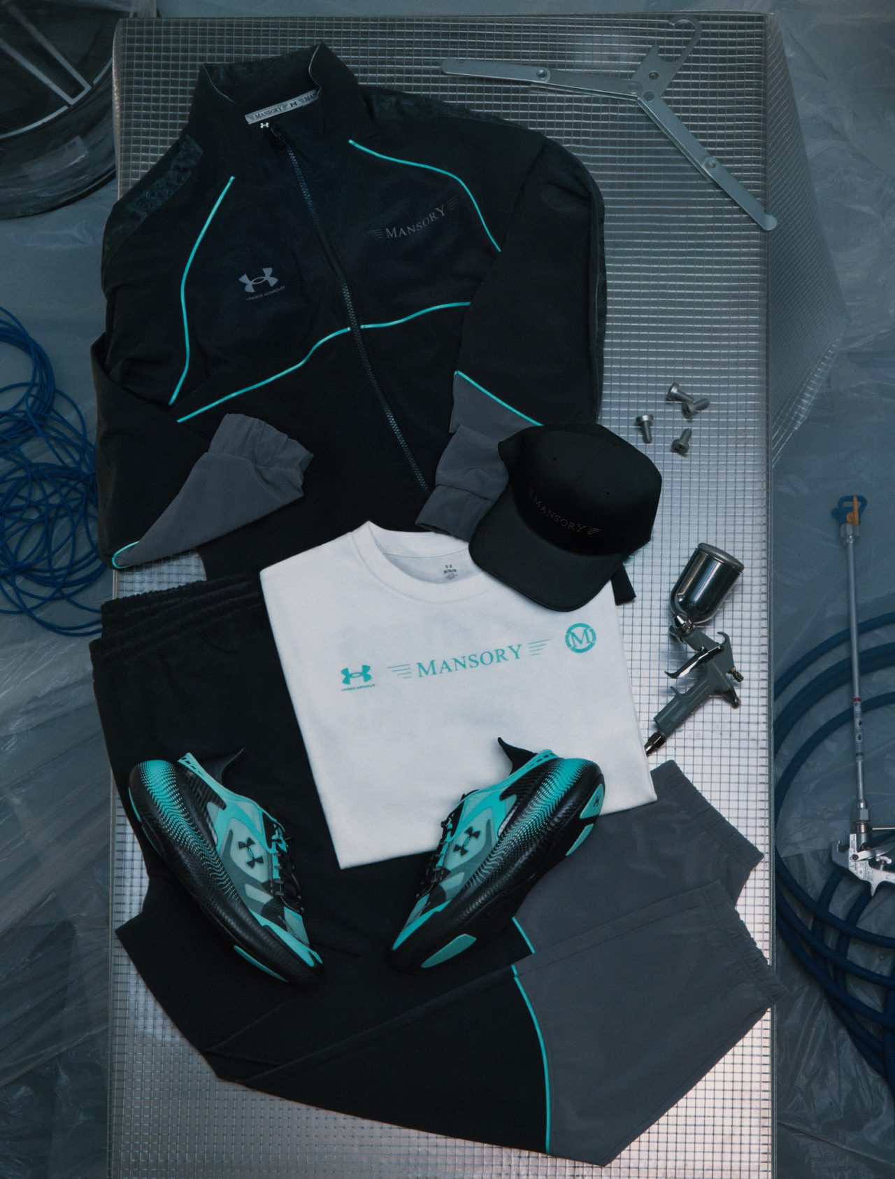 UA X Mansory Shadow Apparel Flat Lay