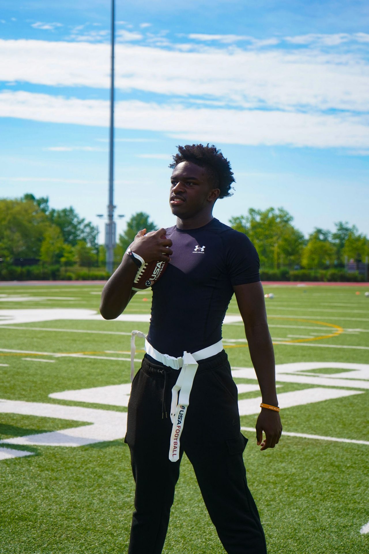 Youth Football Player with Project rampart