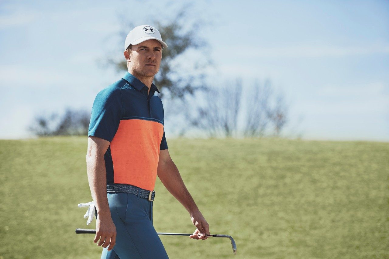 UA Microthread Calibrate Polo, $75, and UA Braided Belt 2.0, $40