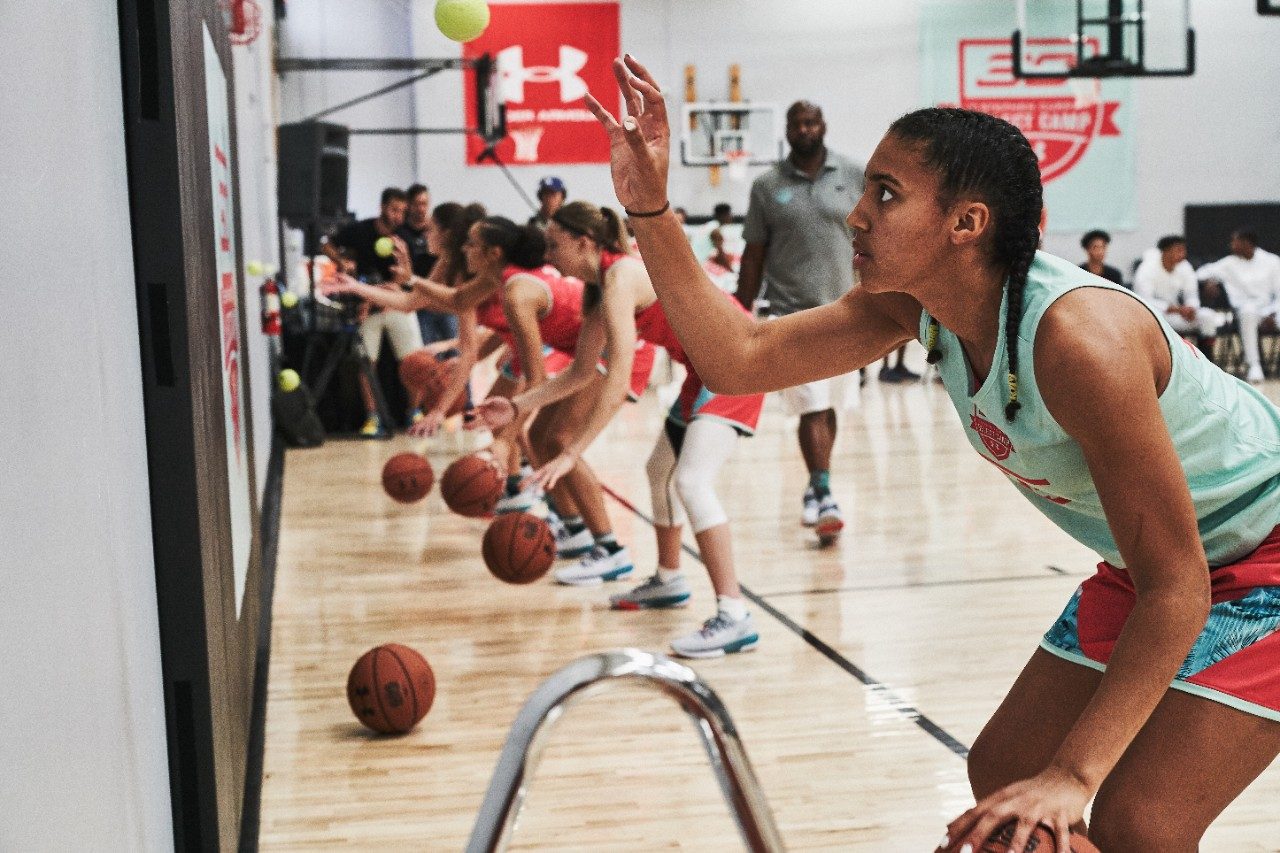 Azzi Fudd participates in a ball-handling drill