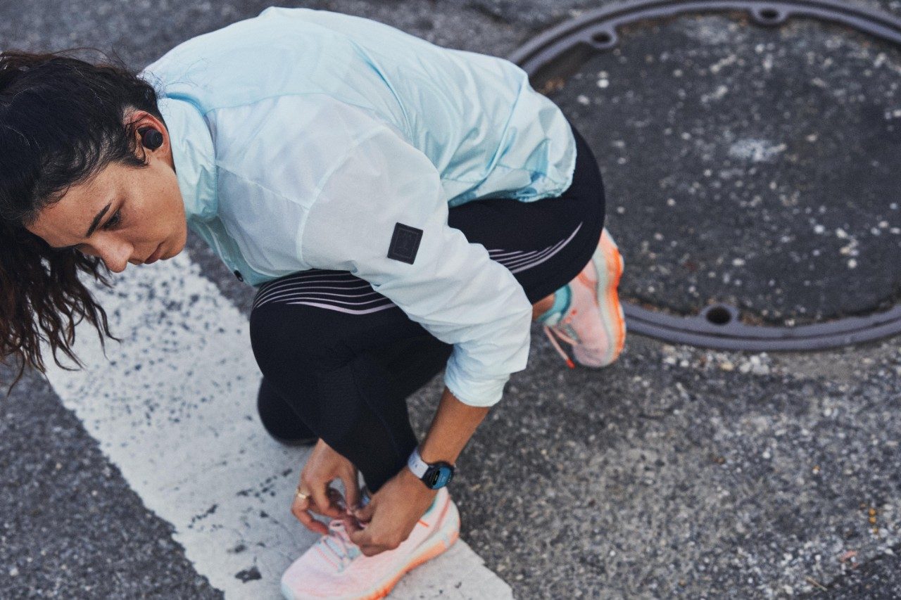 UA RUSH™ Run Stamina Tights and UA True Wireless FLASH Headphones: Gear that goes the distance so you can stay focused on your goals
