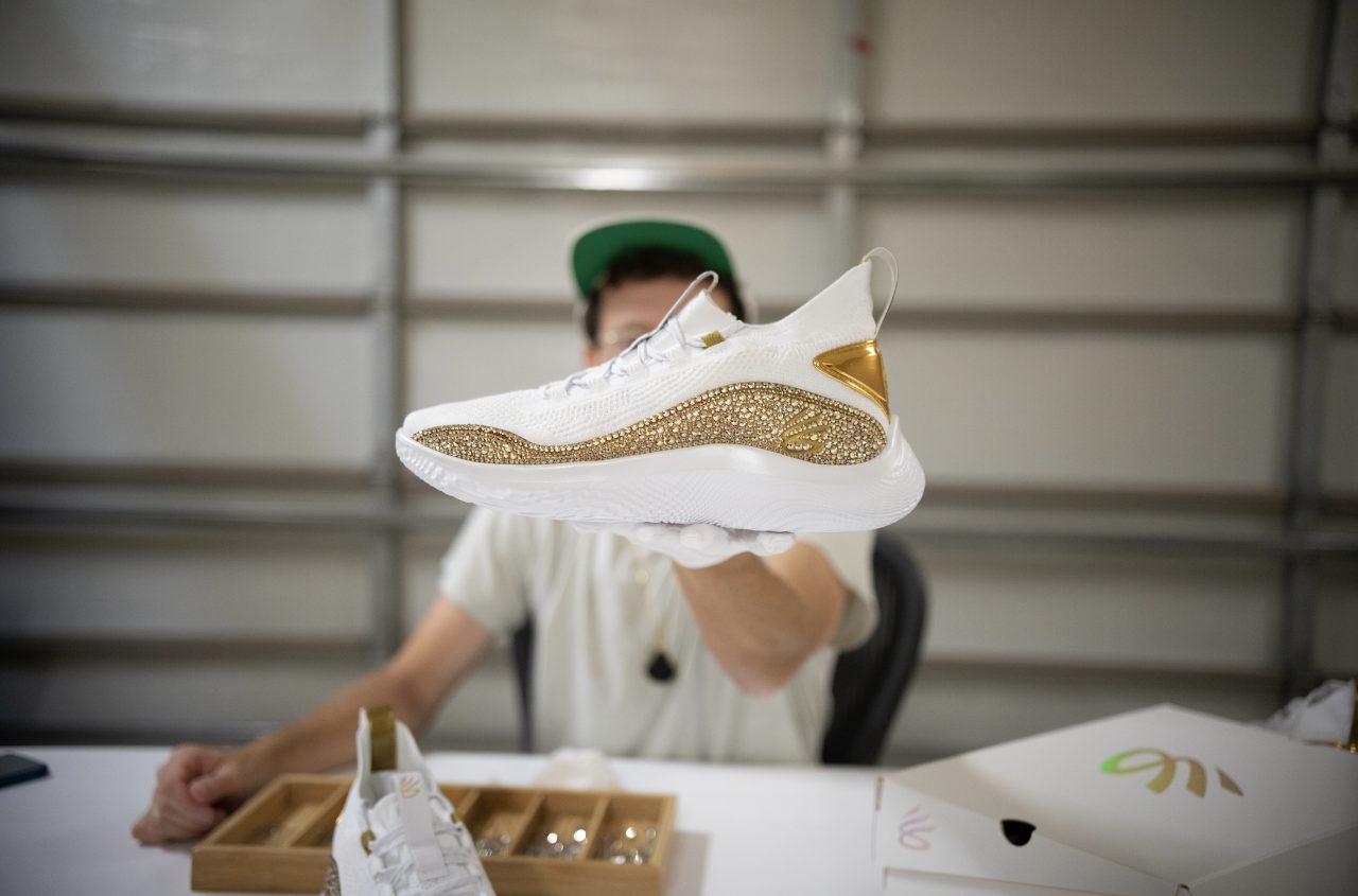 A pair of the “24k” Curry Flow 8s, custom-designed by artist Dan Life.