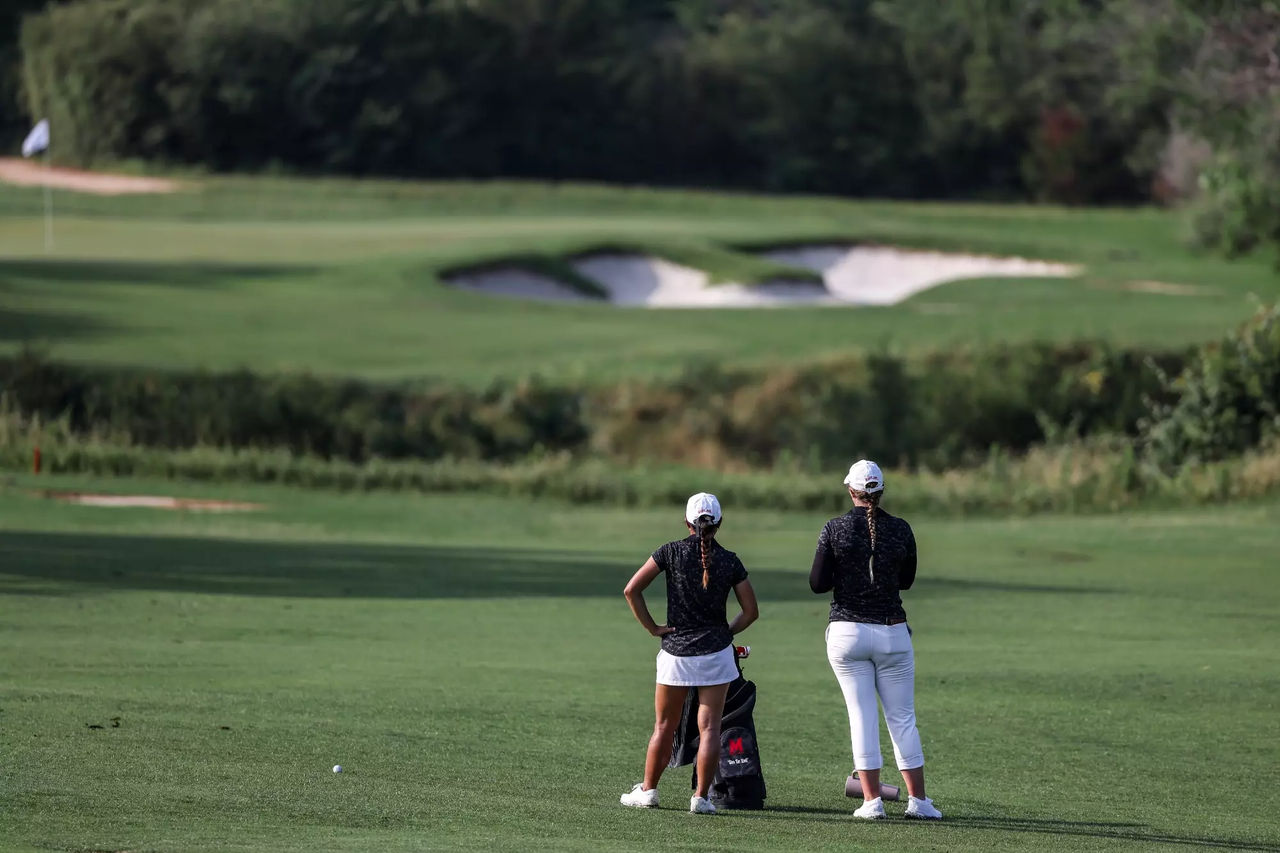 Panassaya Somchit and Assistant Coach Amanda Hollandsworth Maryland Women’s Golf during day 2 of the NCAA Regional at Traditions Club in Bryan, TX on Tuesday, May. 7, 2024. Mackenzie Miles/Maryland Terrapins Photo by Mackenzie Miles/Maryland Terrapins