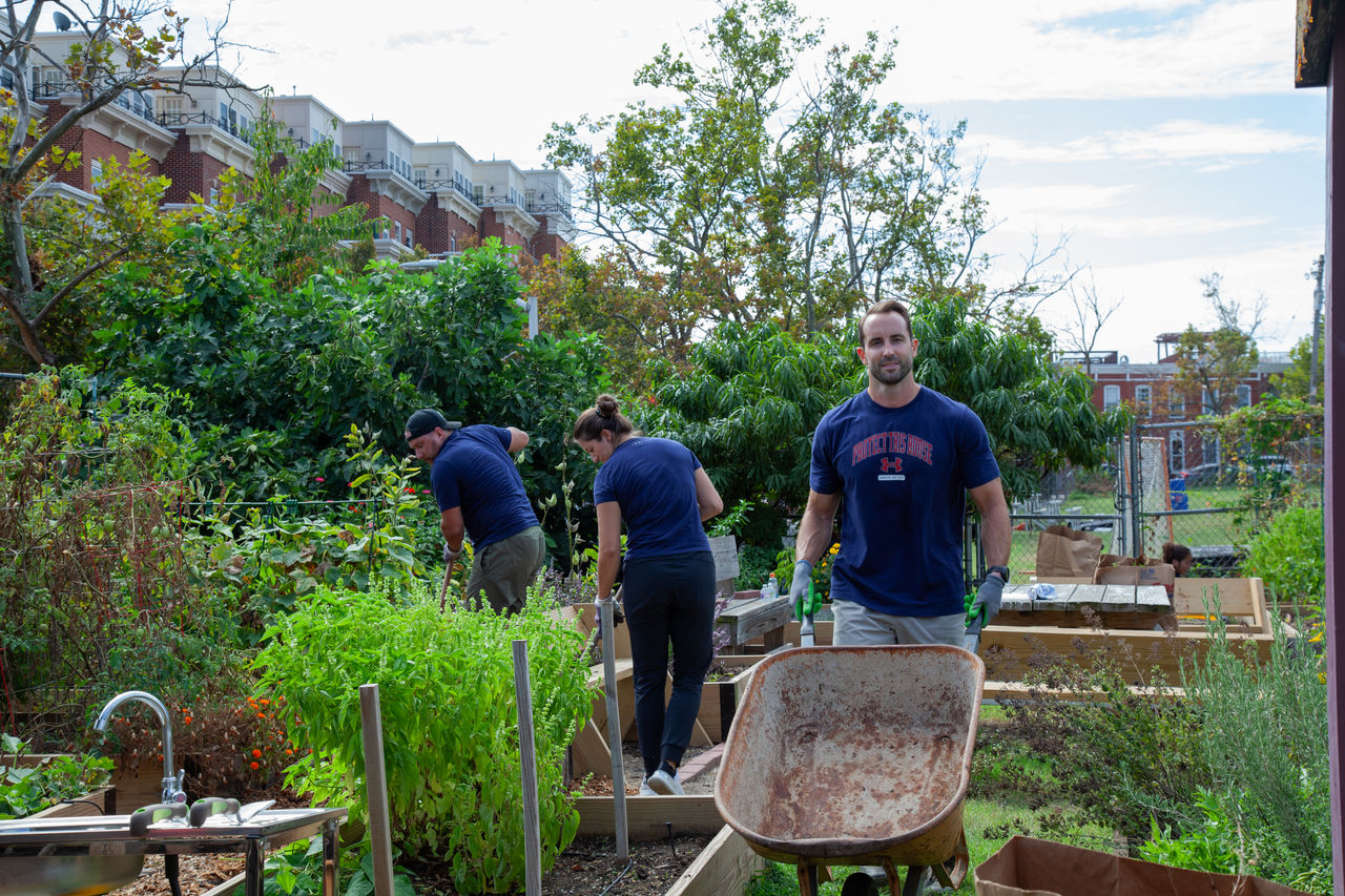 UA Teammate working in Community Garden