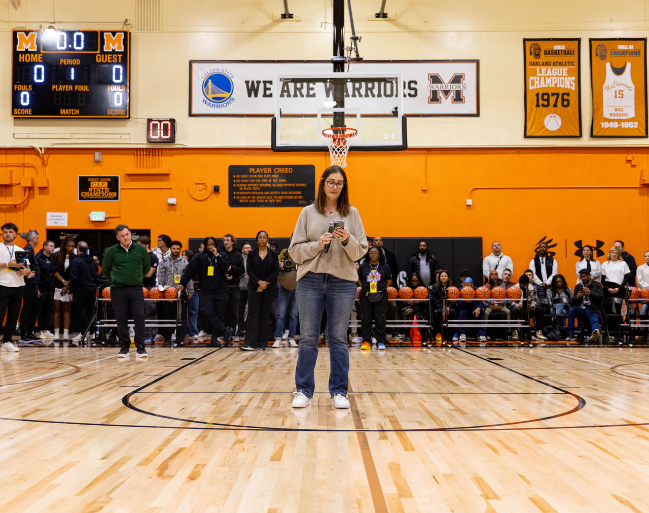 Jeannine Russell giving remarks on court