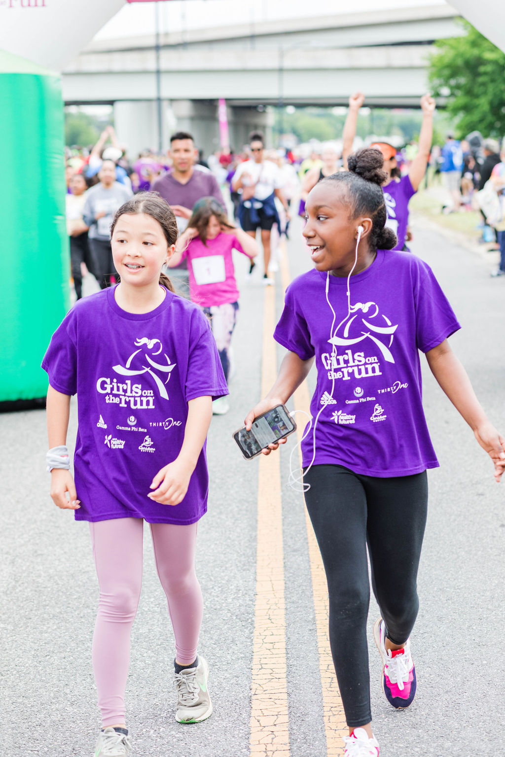Two Girls in Purple Girls on the Run Shirts 