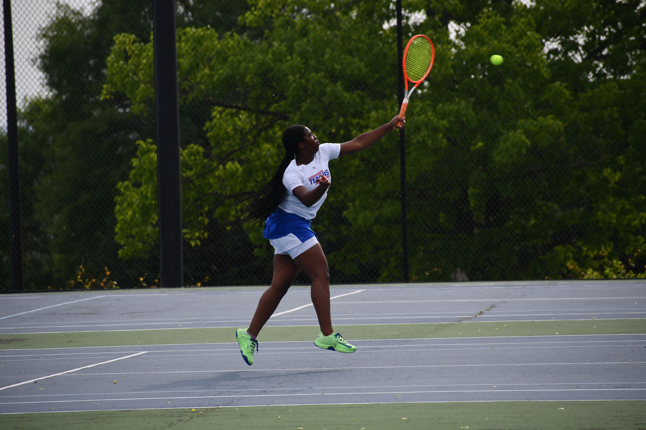 Girl Playing Tennis