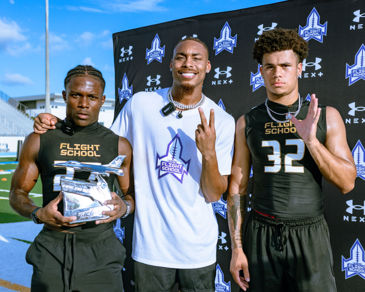 Justin Jefferson Posing with Student Athletes